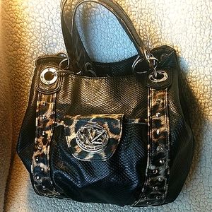 Kathy Van Zeeland large black handbag leopard trim